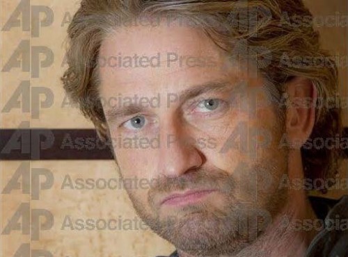 Print - AP __ Images __ Enlarged View __ 120519013755 - France Cannes Gerard Butler Portraits_Page_1.jpg